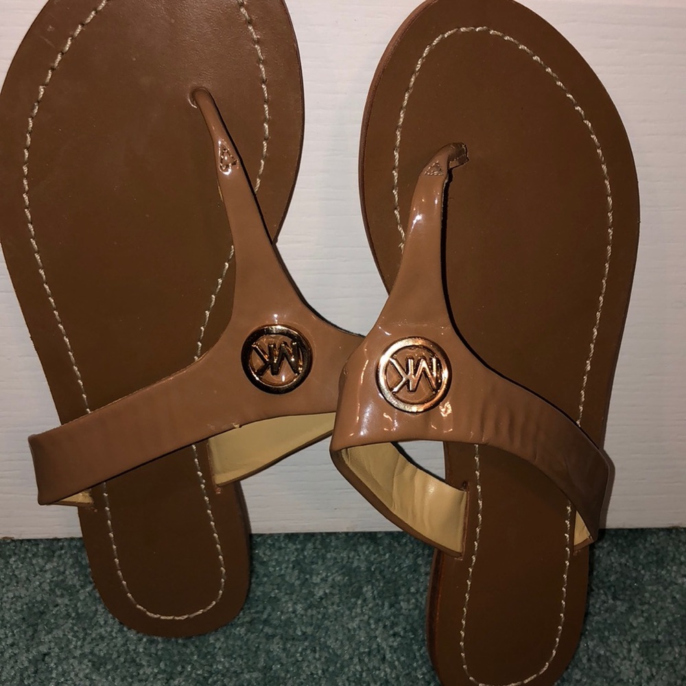 Michael Kors flip flops nude with MK emblem